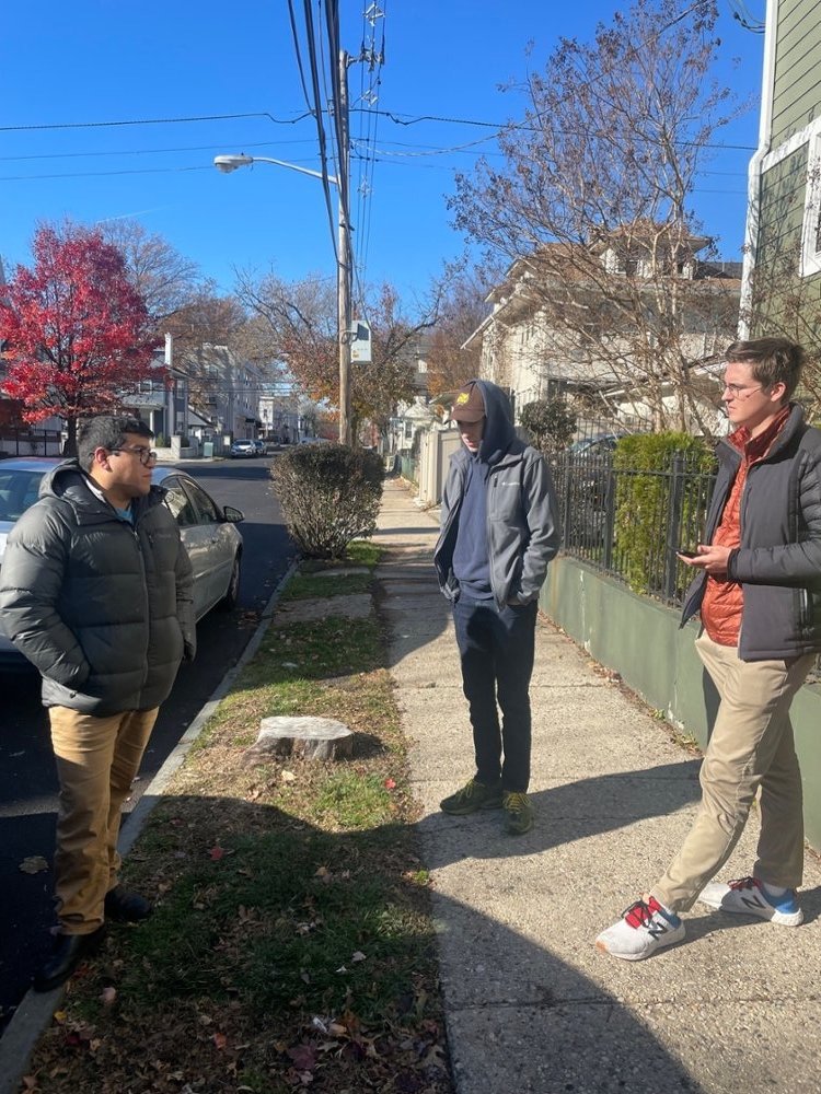 Dr. Quispe with DPS students Graham Luther and Joe Sokolowski at site of recent tree loss in Newark, NJ (photo credit Zachary Christman)