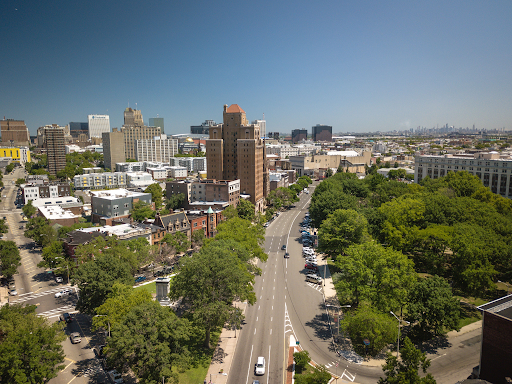 A high-angle view of a Newark city street on a sunny day.