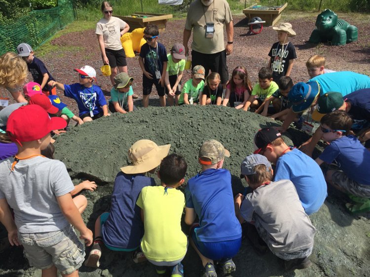 Kids exploring at Fossil Park on Outreach trip