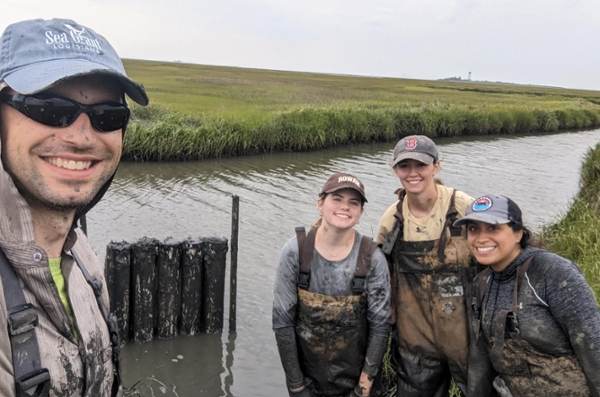 Schutte, left, during a break from field research